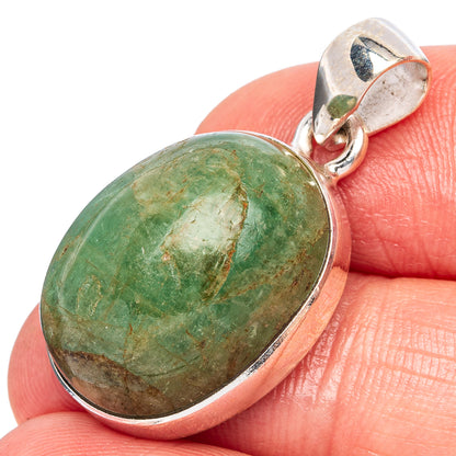 Oval emerald pendant in 925 sterling silver bezel with loop bail