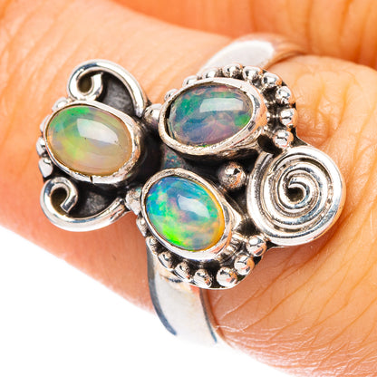 Silver opal cluster ring with three oval Ethiopian opals and side engraved number