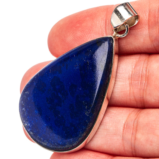 Lapis lazuli teardrop pendant in .925 sterling silver bezel with loop bail