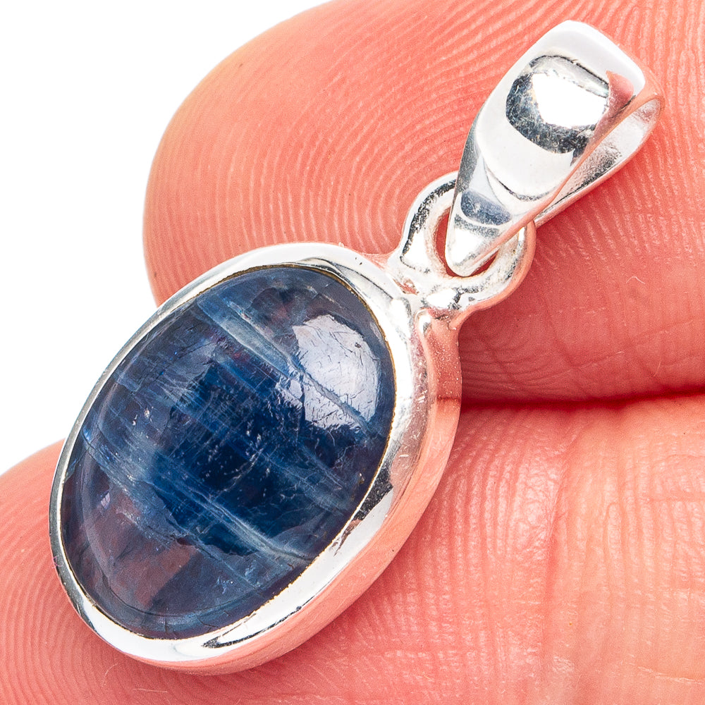 Sterling silver kyanite pendant with oval blue gemstone, silver prong bezel