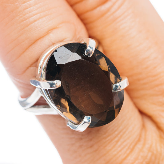 Smoky quartz ring with oval dark faceted stone in .925 sterling silver prong setting
