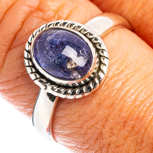 Silver tanzanite ring with oval blue-purple gemstone, ornate bezel, size 8.5