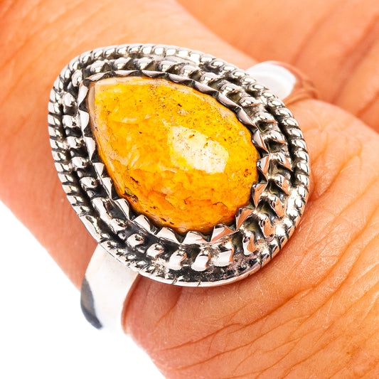 Sterling silver ring with oval yellow-brown bumblebee jasper gemstone bezel setting