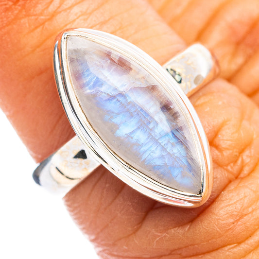 Size 6 sterling silver moonstone ring with oval rainbow-luster cabochon.