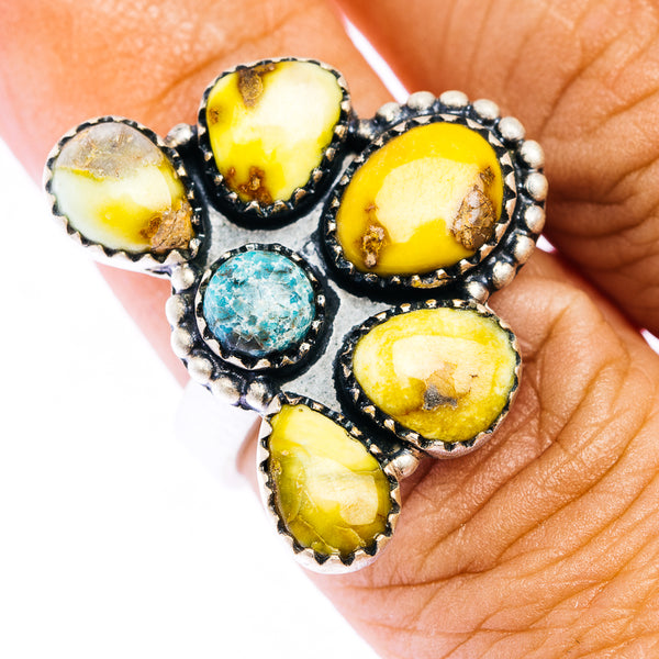 Turquoise and yellow stone cluster ring with silver scalloped bezel