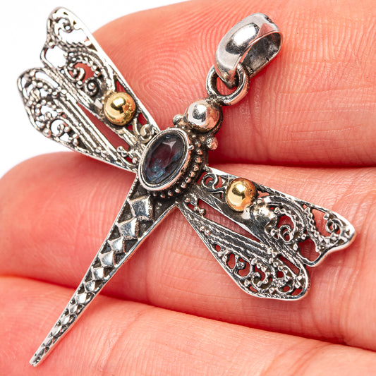 Dragonfly pendant close-up with blue oval stones, .925 sterling silver filigree, gold accents