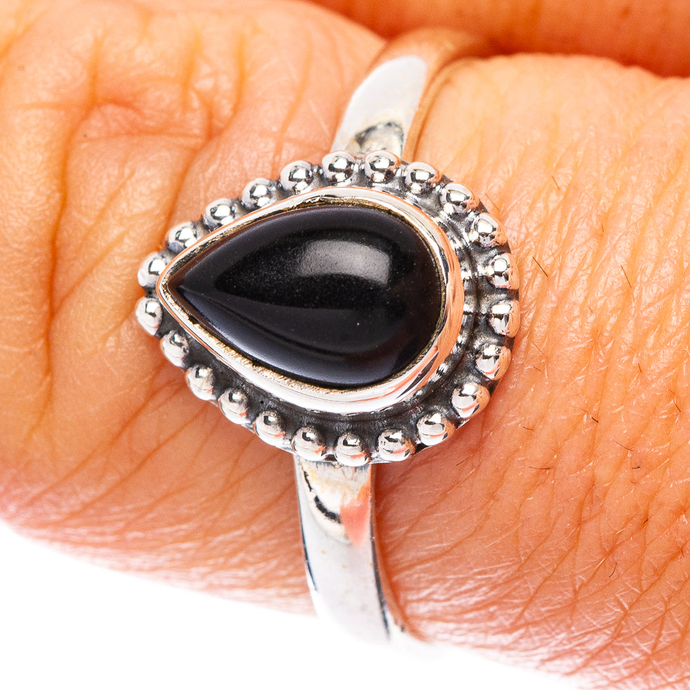 Sterling silver teardrop onyx ring with beaded halo and black gemstone center