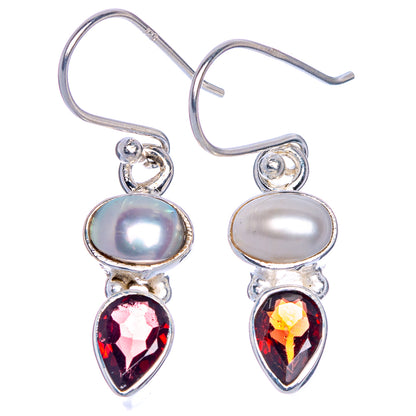 Silver drop earrings with oval cultured pearl and red faceted garnet, hook backs