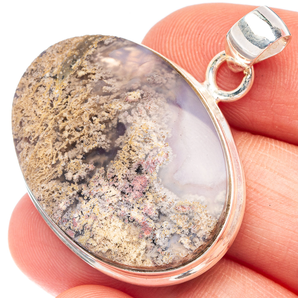 Teardrop plume agate pendant in polished 925 sterling silver bezel and bail