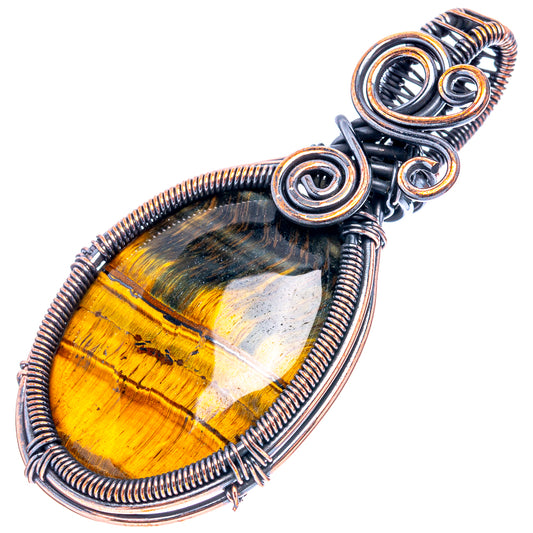 Oxidized copper wire-wrap pendant with oval tiger’s eye stone and spiral loop top