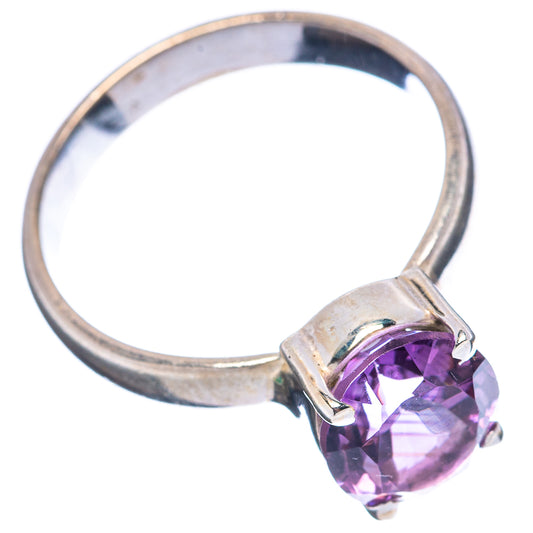 Sterling silver amethyst ring, side view with oval purple gemstone and prong mount