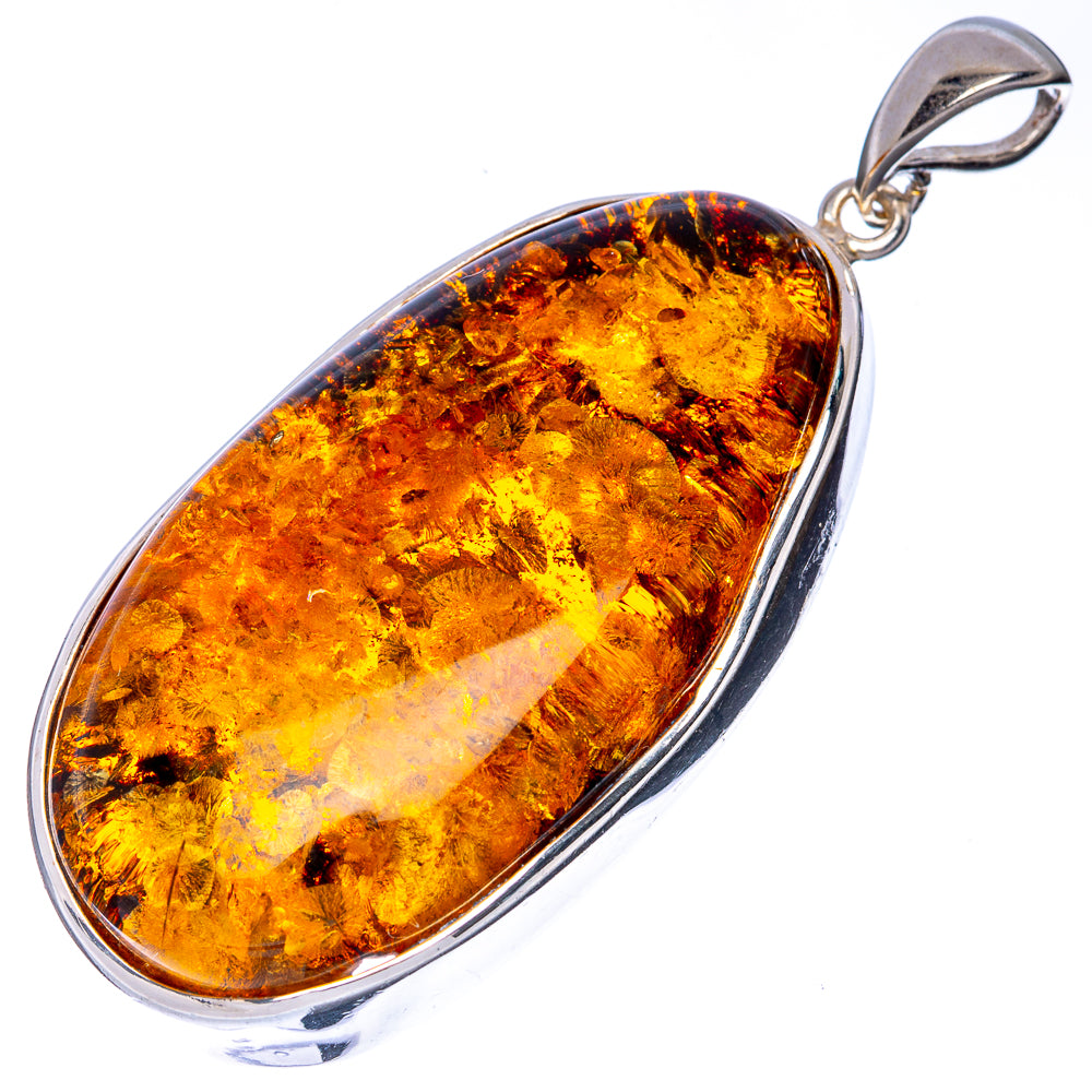 Oval honey Baltic amber pendant in polished 925 sterling silver