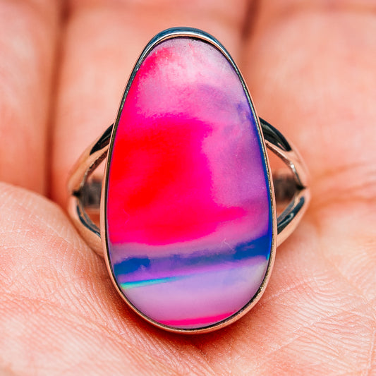 Sterling silver teardrop opal ring, pink center with blue-violet band