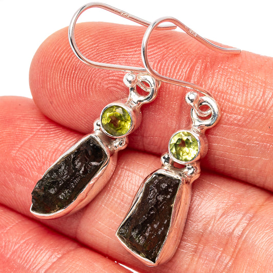 Sterling silver drop earrings with green moldavite teardrop stones and round green accents