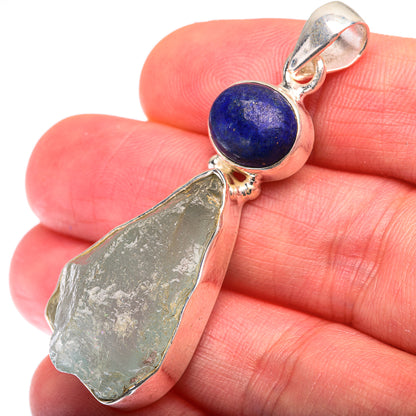 Sterling silver pendant with blue lapis round stone and raw green aquamarine slice