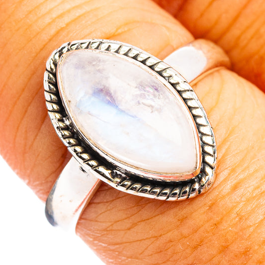 Oval rainbow moonstone ring in .925 sterling silver with ornate bezel