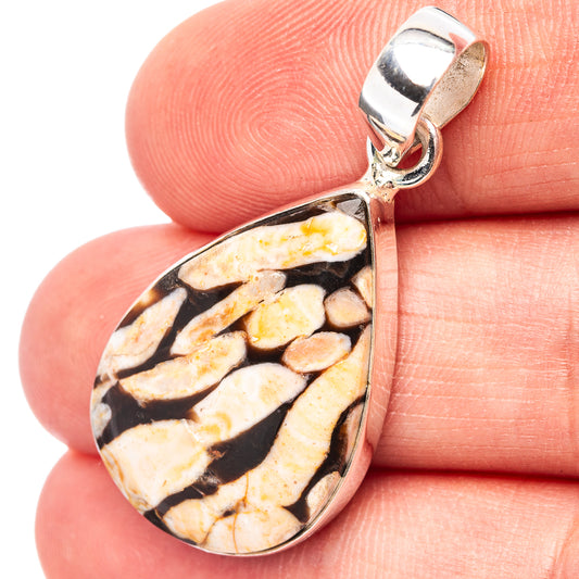 Teardrop jasper pendant with .925 sterling silver bail, black and cream mottled stone.