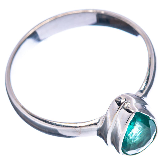 Green emerald accent sterling silver ring, side view with split prong detail