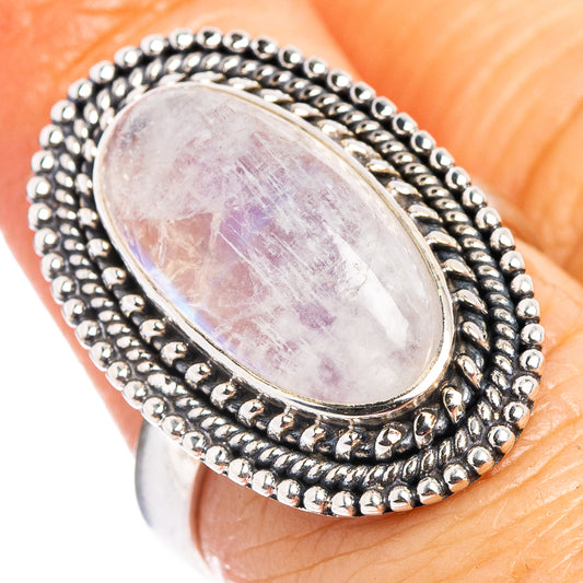Oval moonstone ring in sterling silver with beaded rope setting, close-up