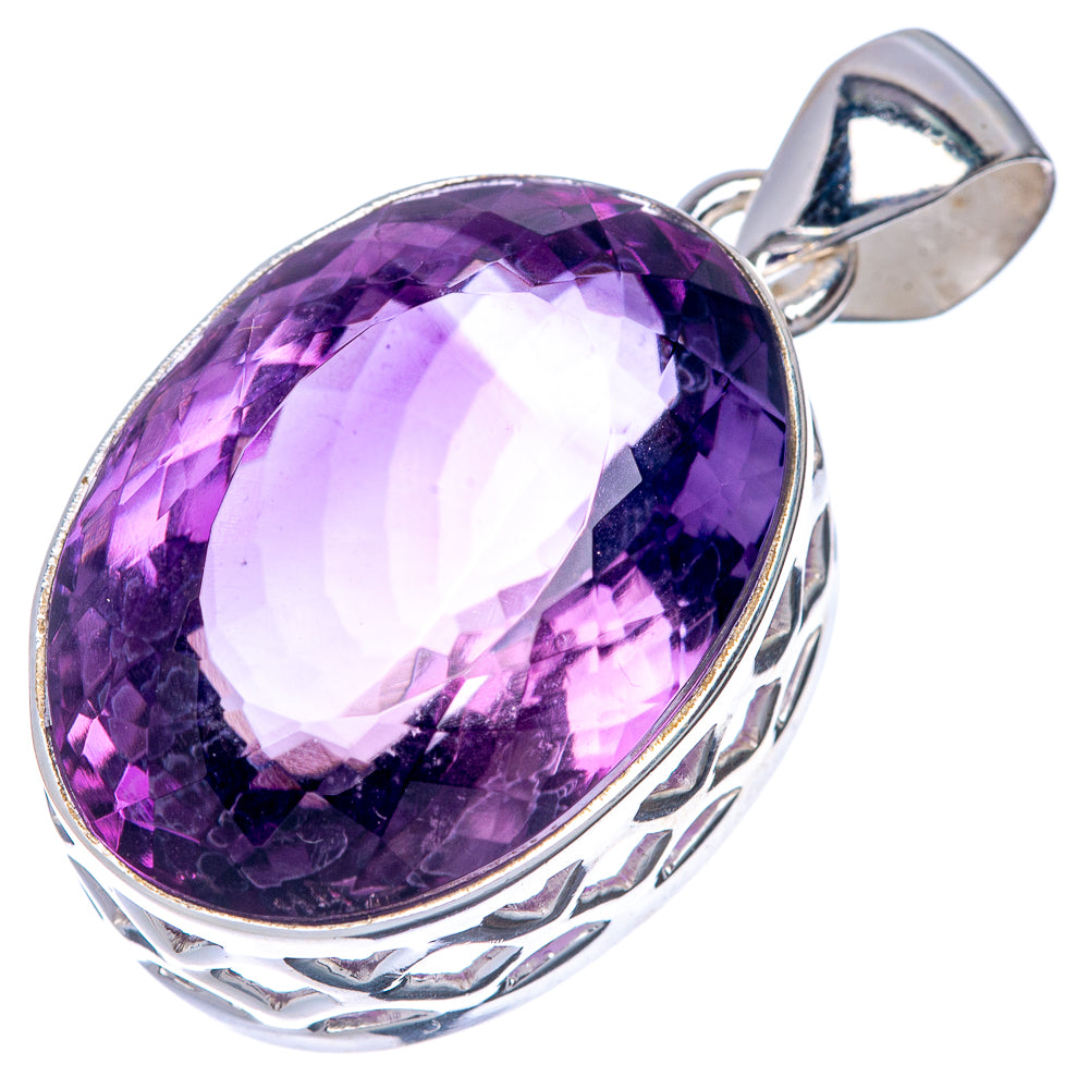 Oval faceted amethyst pendant with sterling silver bezel and hinged bail