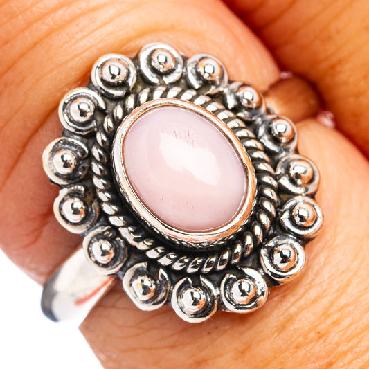 Pink opal cabochon sterling silver ring with ornate beaded halo setting