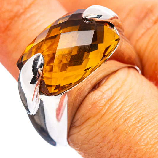 Sterling silver ring with large faceted amber quartz teardrop and high-polish band
