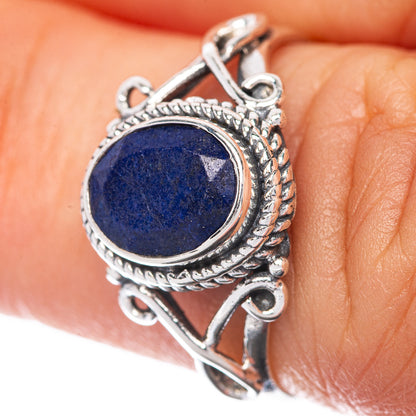 Sterling silver sapphire dainty ring with oval blue stone bezel and ornate border