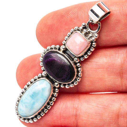 Sterling silver pendant with pink opal, purple sugilite, and blue larimar stones
