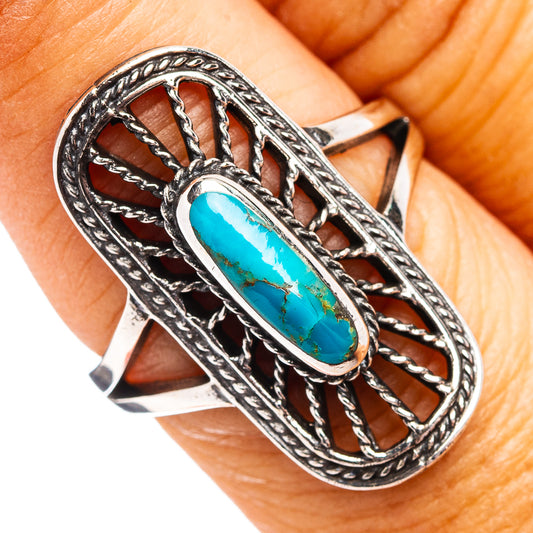 Turquoise oval cabochon ring in .925 sterling silver, openwork frame and rope border