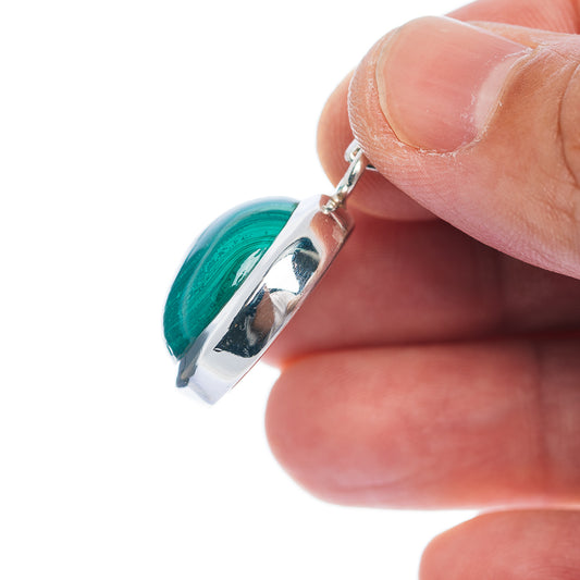 Round malachite pendant in .925 sterling silver, side view of bail and setting