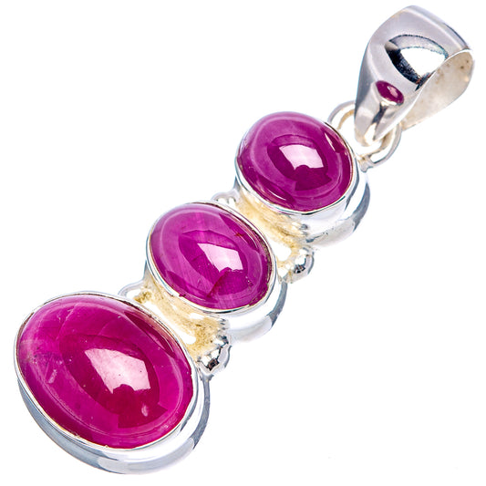 Oval three-stone ruby pendant in .925 sterling silver with top bail and purple stones