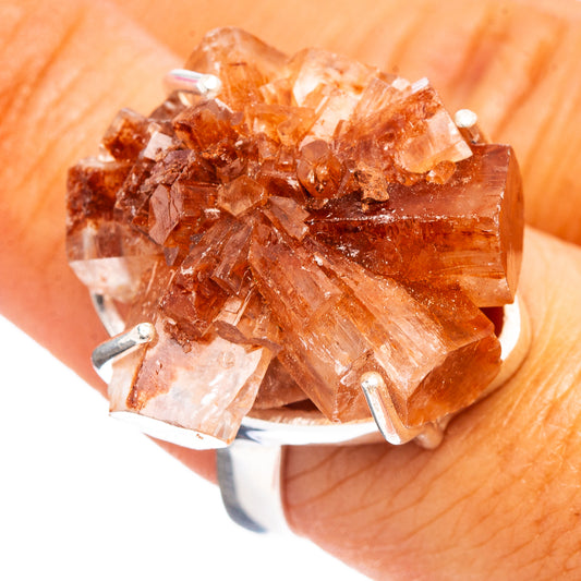 Raw orange aragonite crystal cluster sterling silver ring, prong-set on dark band
