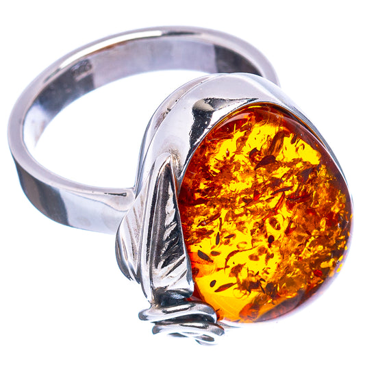 Oval Baltic amber cabochon in .925 sterling silver adjustable ring, size 7