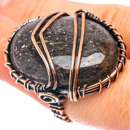 Oxidized copper wire-wrap ring with dark druzy stone and blackened accents