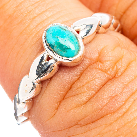 Sterling silver turquoise ring with oval bezel and split-shank setting