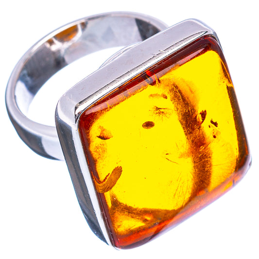 Adjustable sterling silver ring with yellow-orange amber square cabochon