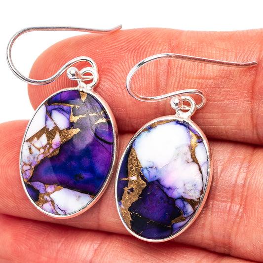 Oval purple-and-blue stone earrings with .925 sterling silver hooks, gold flecks close-up
