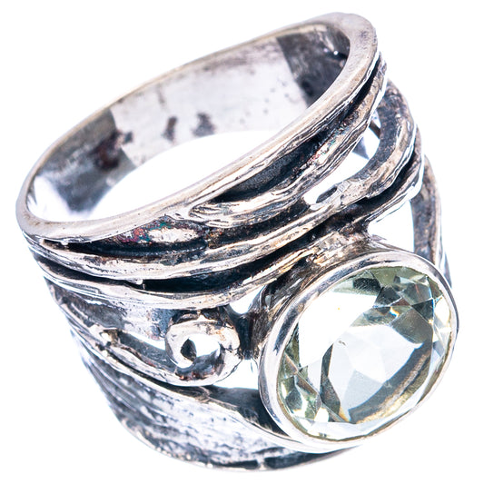Sterling silver amethyst ring with curved band and round bezel-set green stone