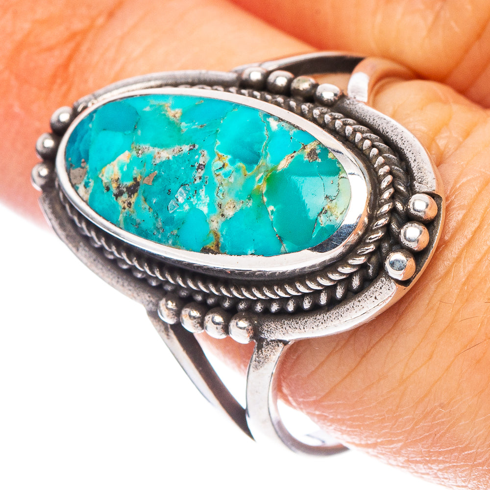 Sterling silver oval turquoise ring with textured rope bezel, size 8.5