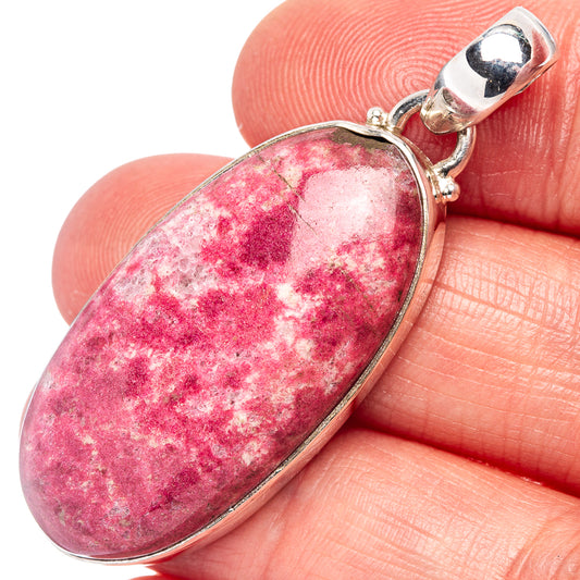 Thulite oval pendant in .925 sterling silver, pink marbled stone with bail.