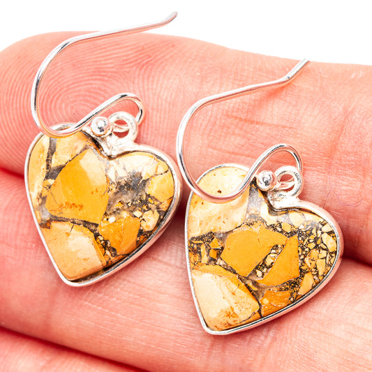 Heart-shaped mookaite stone earrings in yellow, orange, and brown with sterling silver hooks