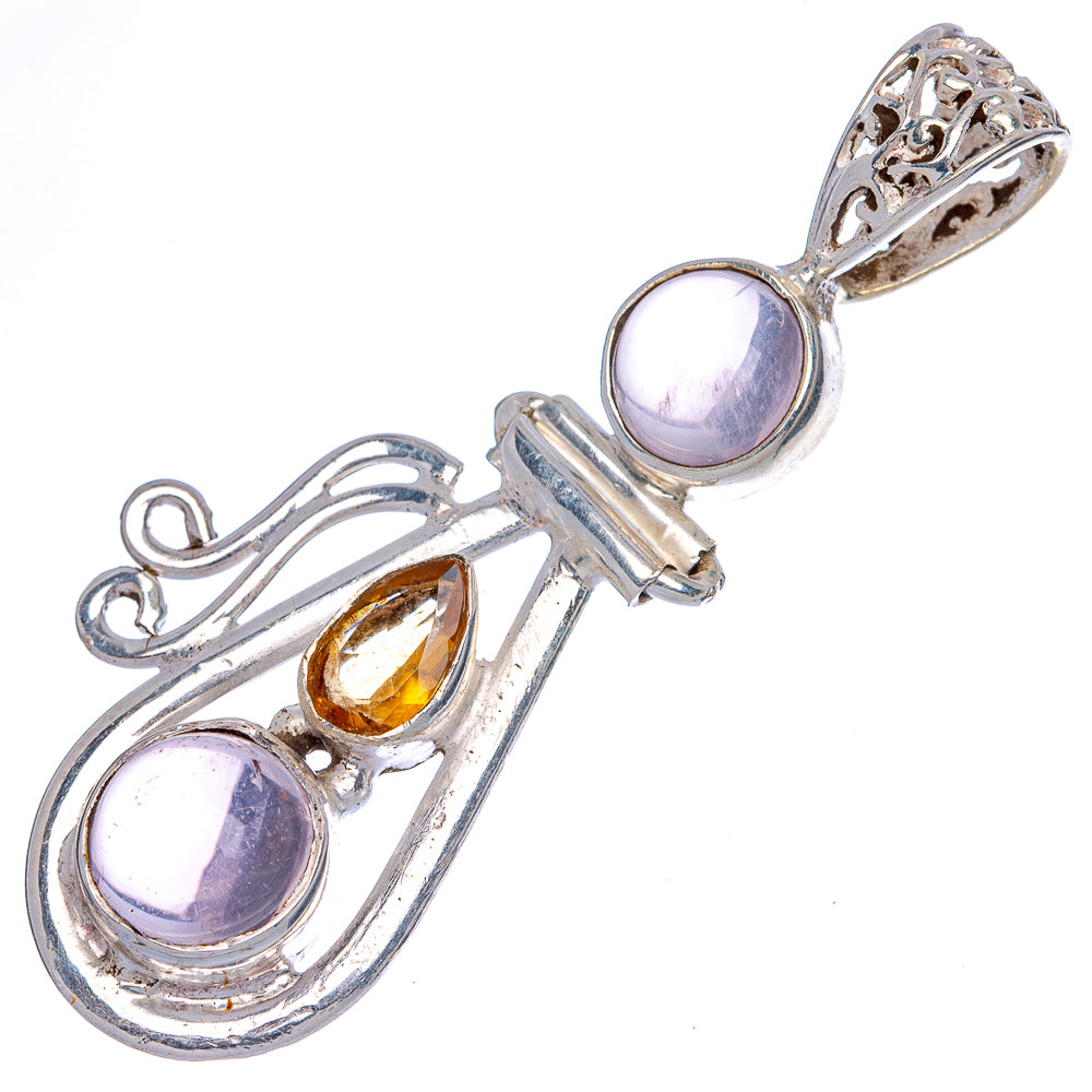 Oval rose quartz and citrine gemstone pendant in ornate sterling silver setting