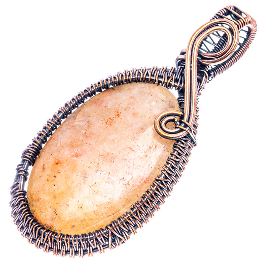 Oxidized copper wire-wrapped pendant with teardrop stone and top loop bail