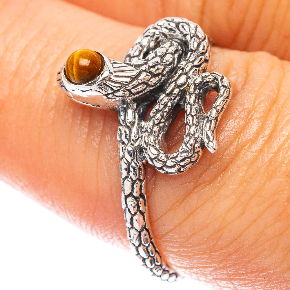 Sterling silver snake ring with amber tiger-eye cabochon stone
