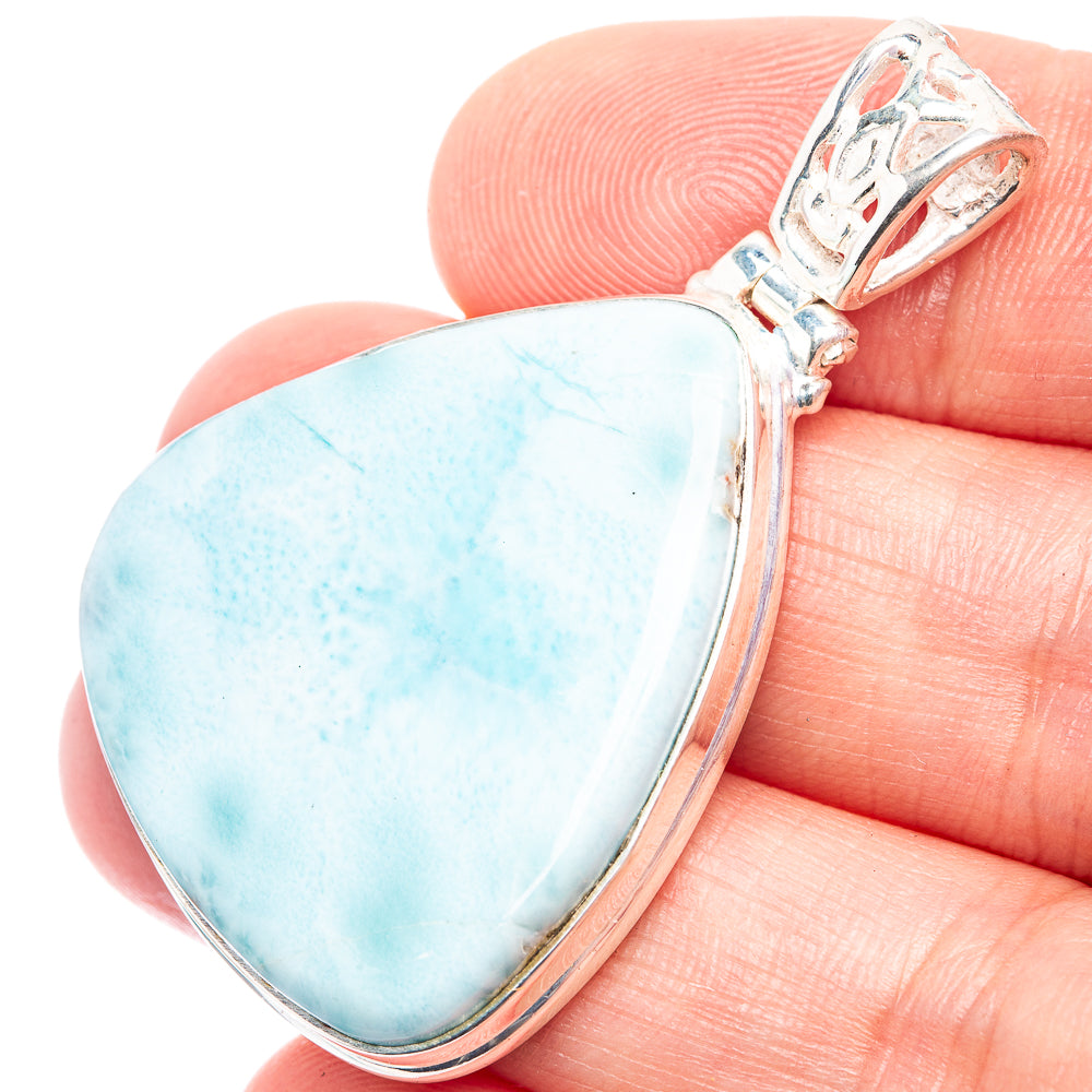 Larimar stone pendant in sterling silver, teardrop cabochon with top bail