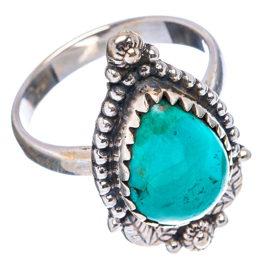 Oval turquoise cabochon ring in .925 sterling silver with ornate beaded setting