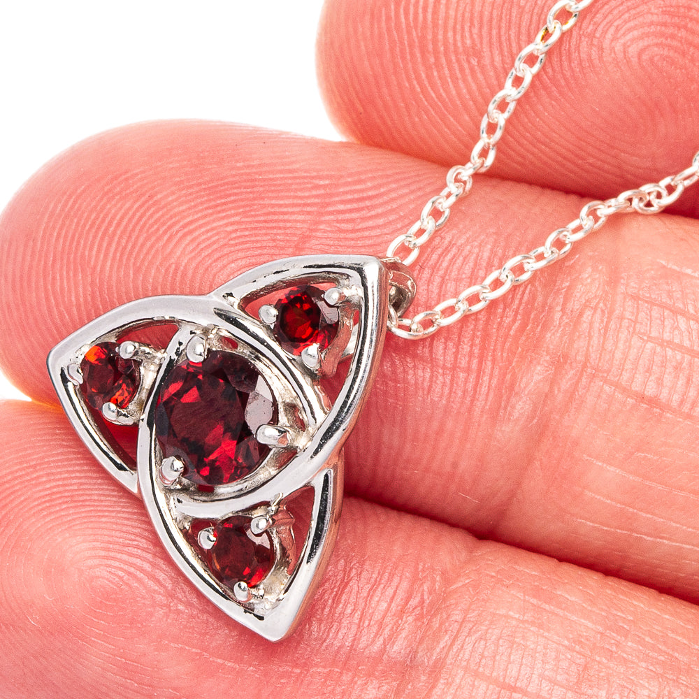 Sterling silver garnet necklace: triangular pendant with red gemstones, link chain