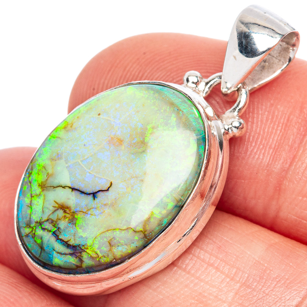 Sterling silver opal pendant with oval green-orange multicolor cabochon bezel