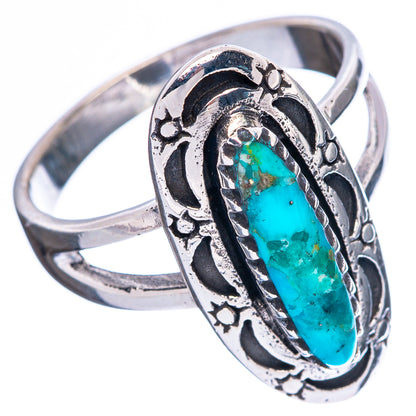 Sterling silver turquoise ring, oval cabochon with dark filigree and beaded border