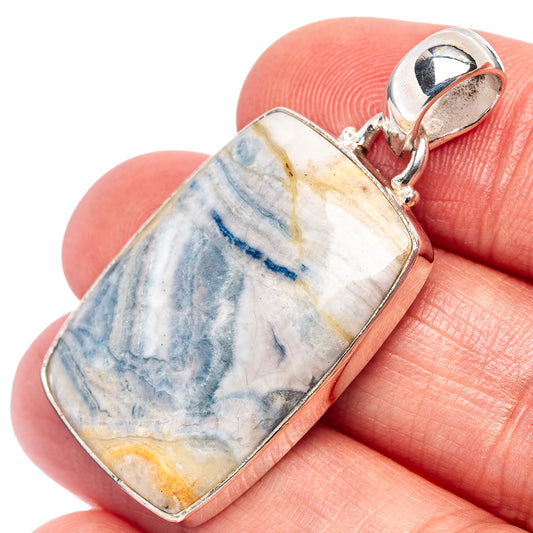 Sterling silver pendant with rectangular blue scheelite stone and rounded bail detail